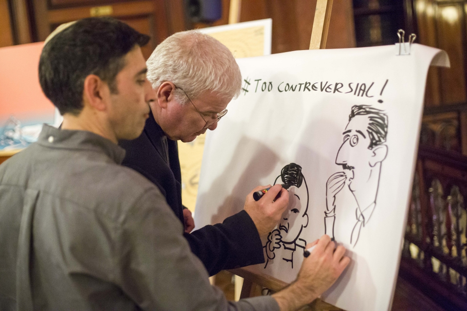 Artists of The Israeli Cartoon Project sketch an impromptu cartoon